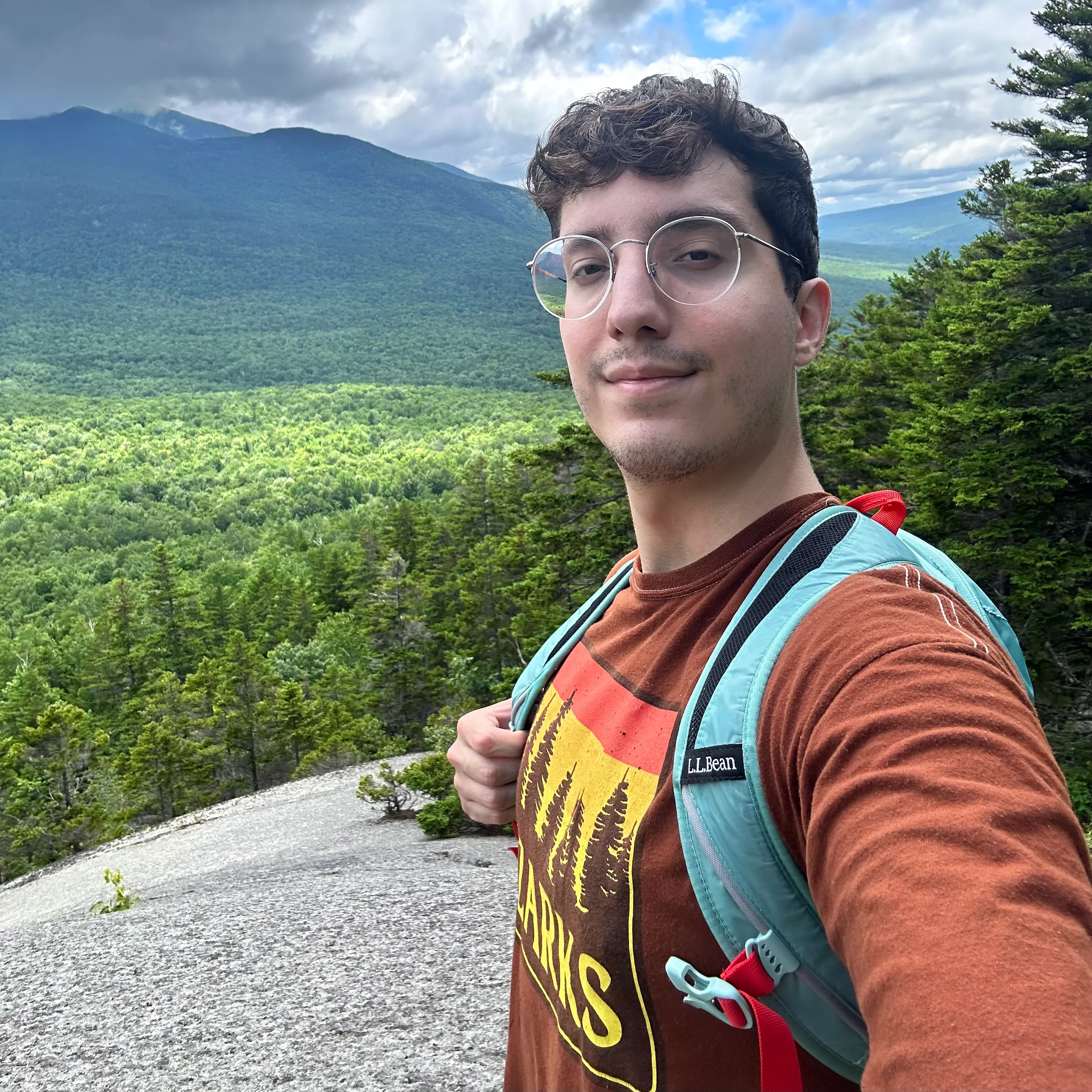 Joe on top of a montain