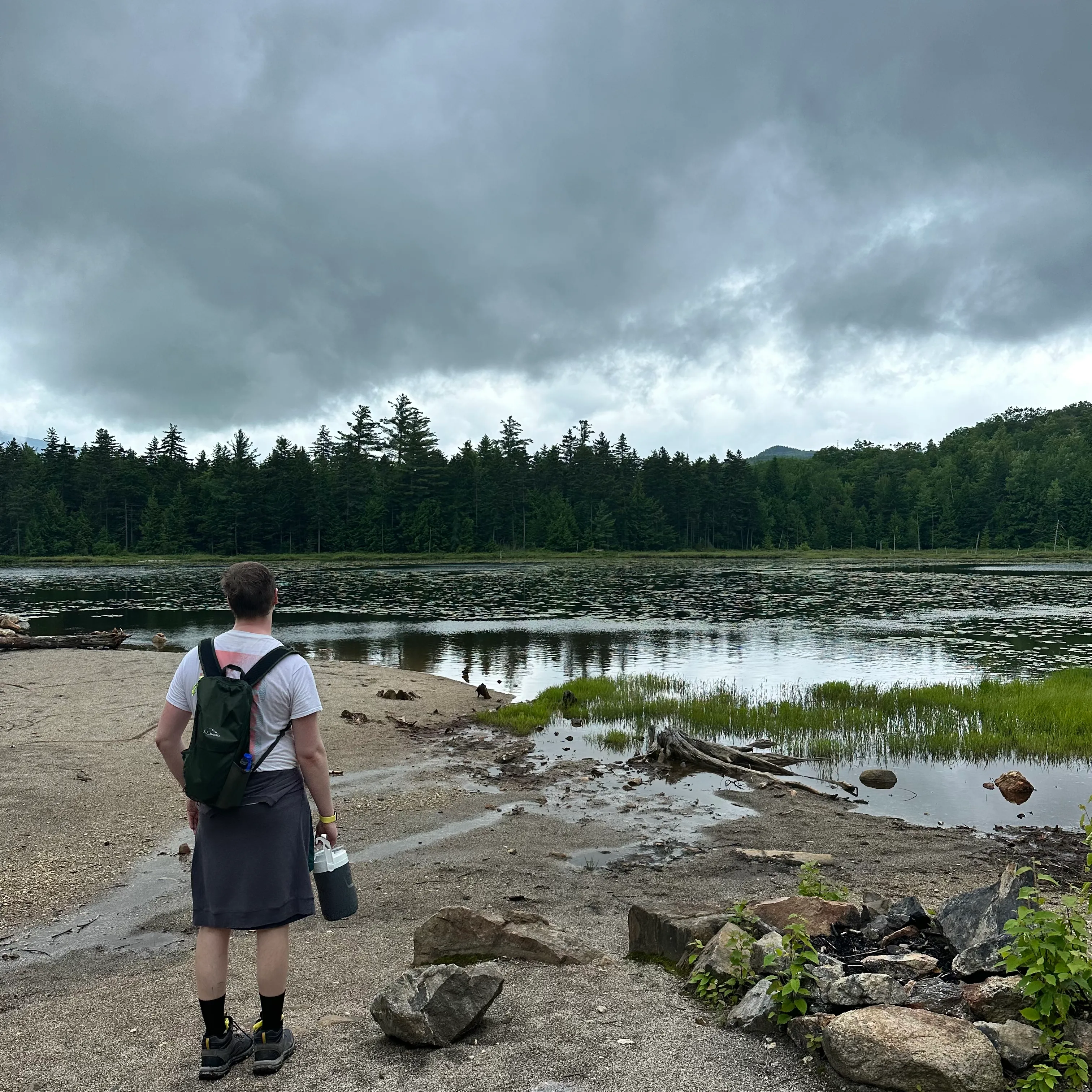 Dylan looking out at the mountain river